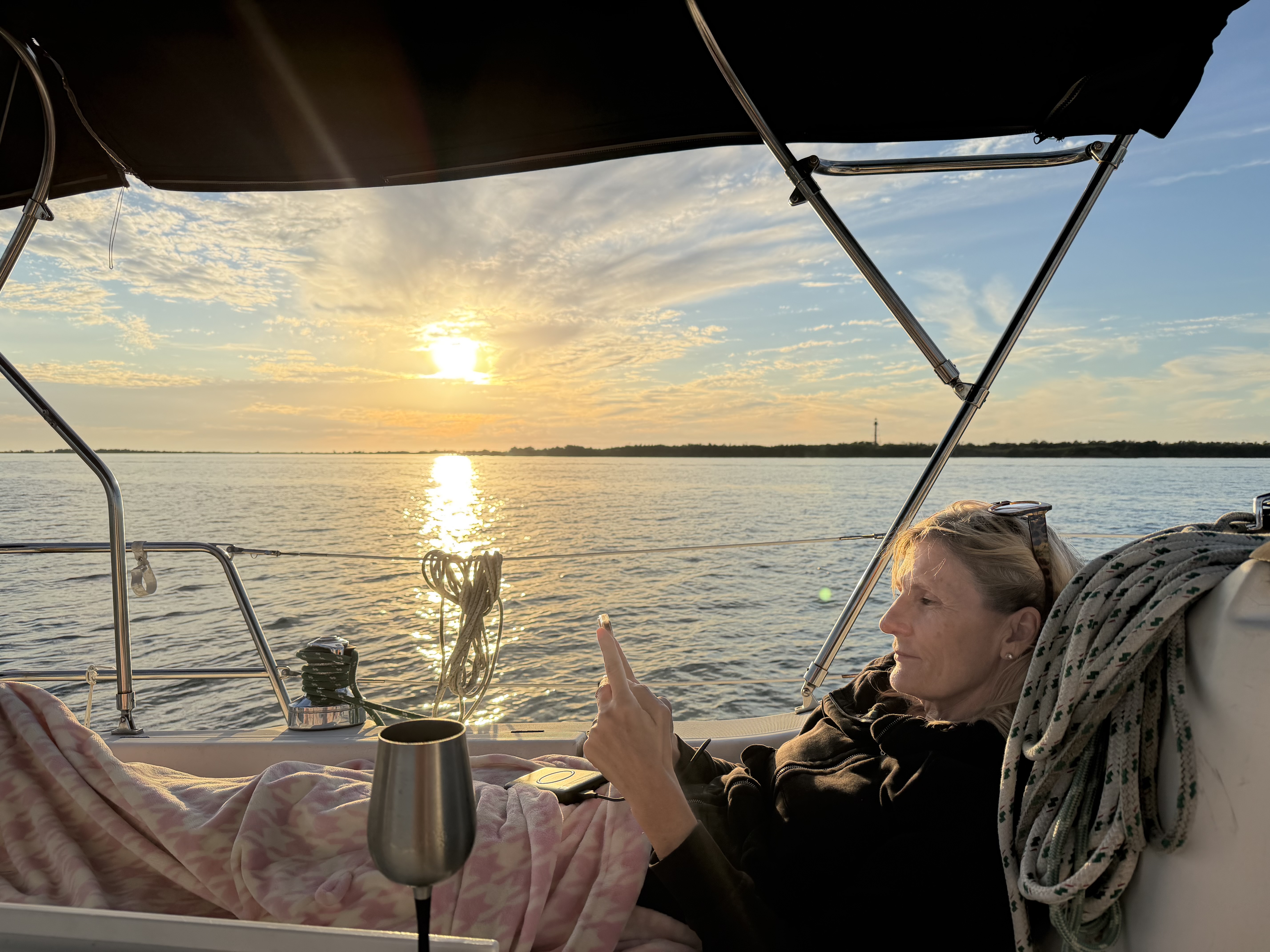 Jodi enjoying sunset at Anclote Key anchorage